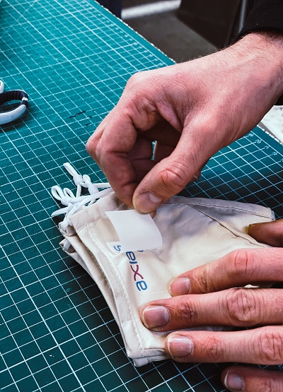 masques personnalisés entreprise axians - découverte du logo